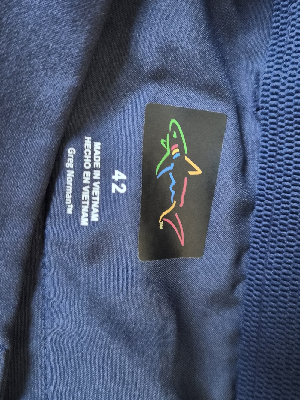 Greg Norman Polo Short - Navy with Multicolor Shark Logo